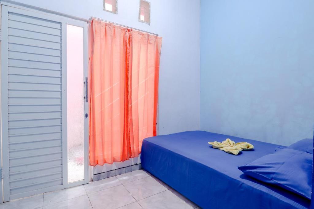 Pinky Guest House Syariah Kota Batu エクステリア 写真